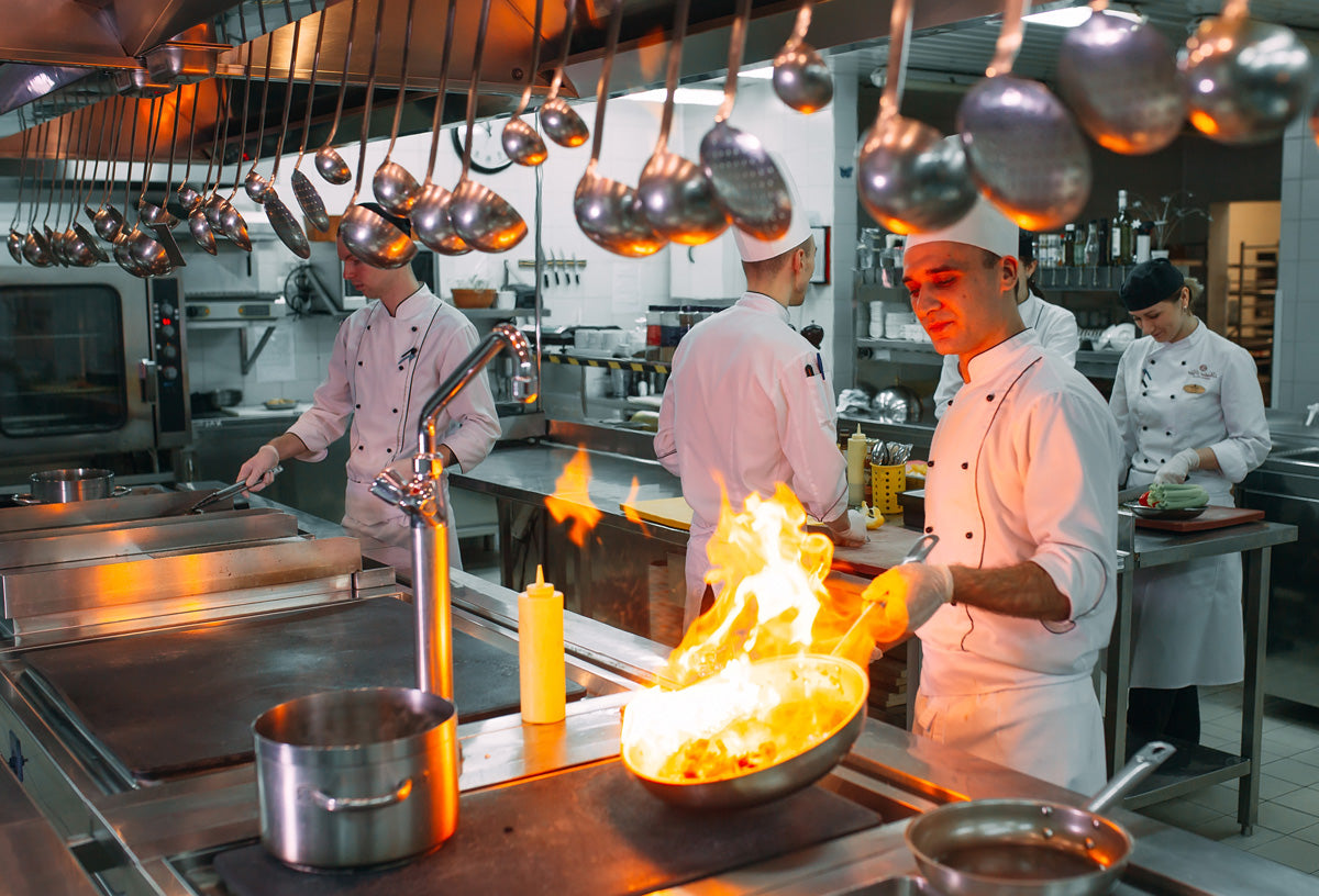 hot pepper mix being used by professional chefs in a commercial kitchen